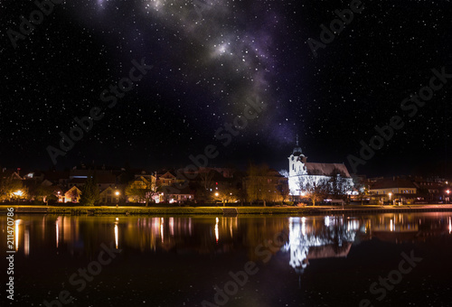 Milky way over old czech town