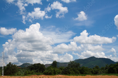 blue sky with cloud over the mountain in sunny day
