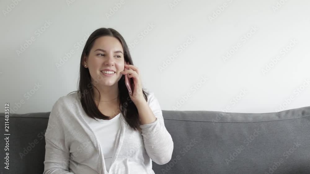 Happy smiling teen talks to a phone. Green screen chroma key Happy smiling teen talks to a phone. Green screen chroma key