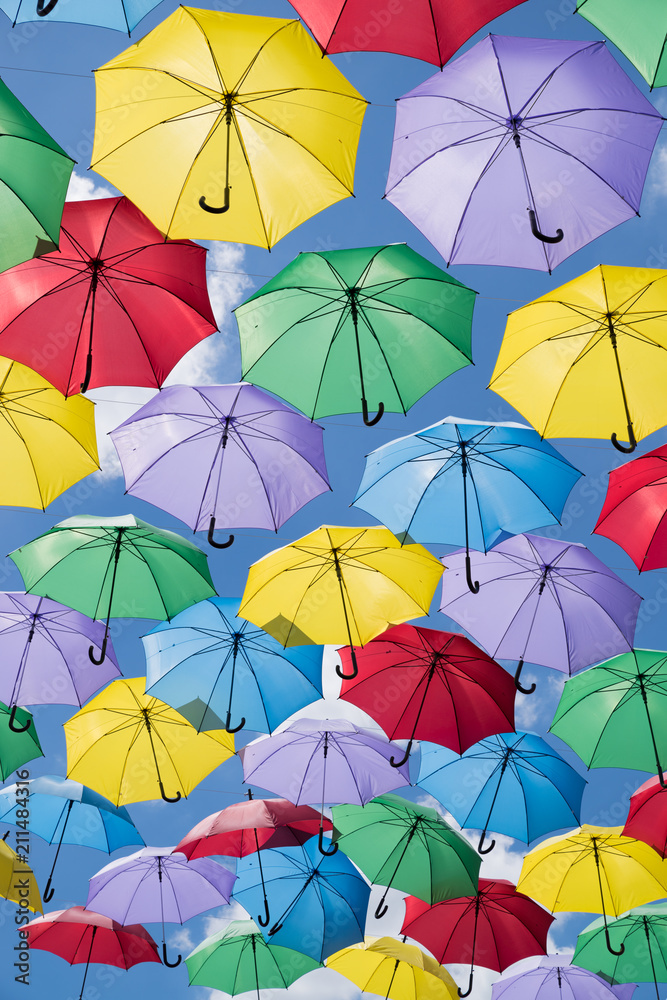 Colorful umbrellas in the sky Colorful umbrellas in the sky