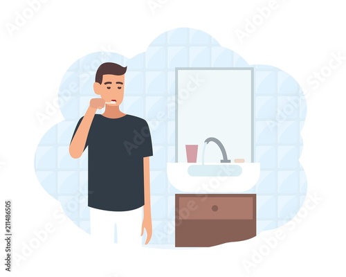 Young man standing in front of mirror in bathroom and brushing his teeth with toothbrush. Daily morning routine, oral or dental hygiene procedure. Flat cartoon colorful vector illustration.