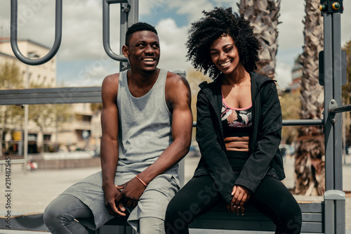 Young happy black couple outdoors