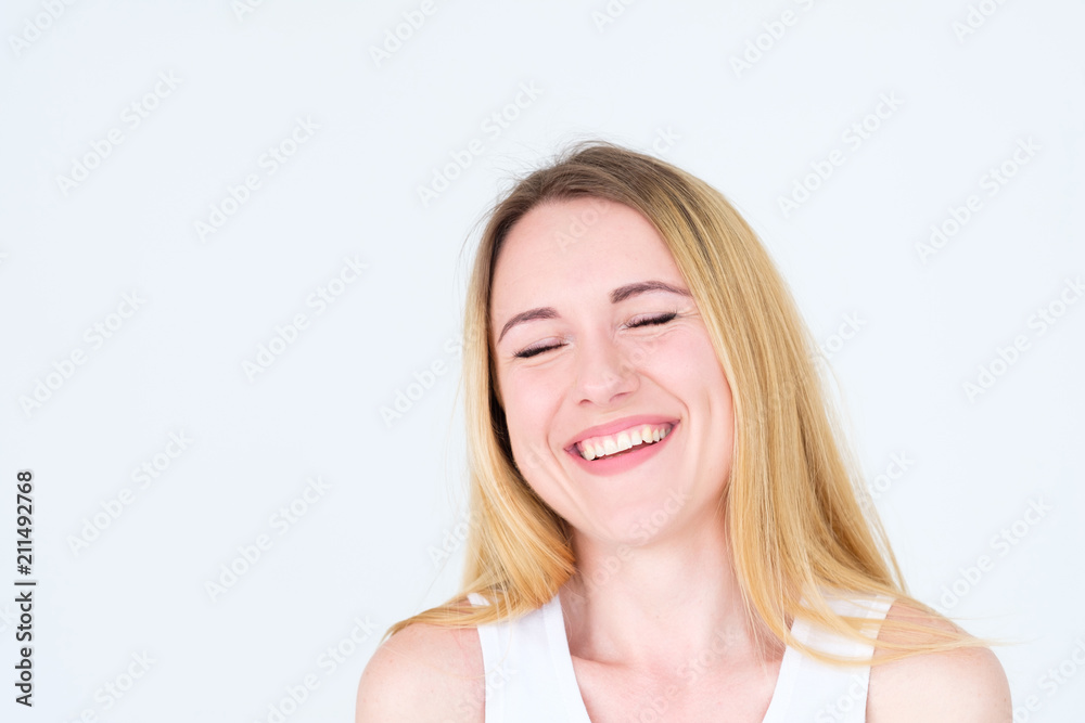 emotion face. very happy joyful thrilled to bits woman with beaming smile. young beautiful blond girl portrait on white background. emotion face. very happy joyful thrilled to bits woman with beaming smile. young beautiful blond girl portrait on white background.