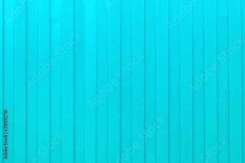 Turquoise metal fence as a background