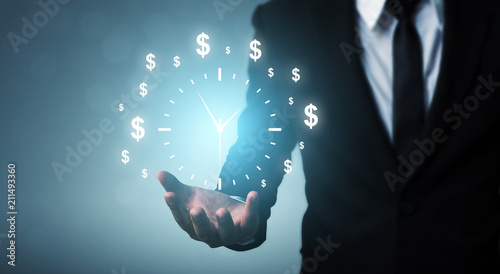 Schilderij op canvas Businessman holding sign clock. Concept business time is money