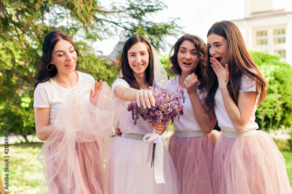 The girlfriends share happiness with the bride