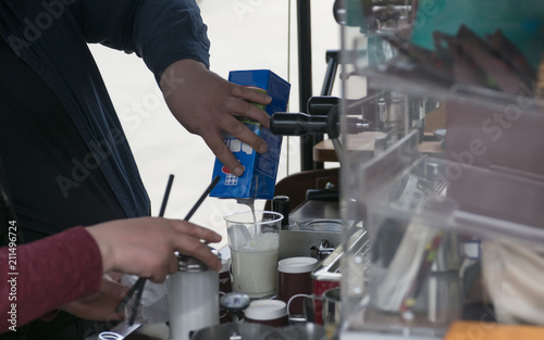barista prepares coffee frappe