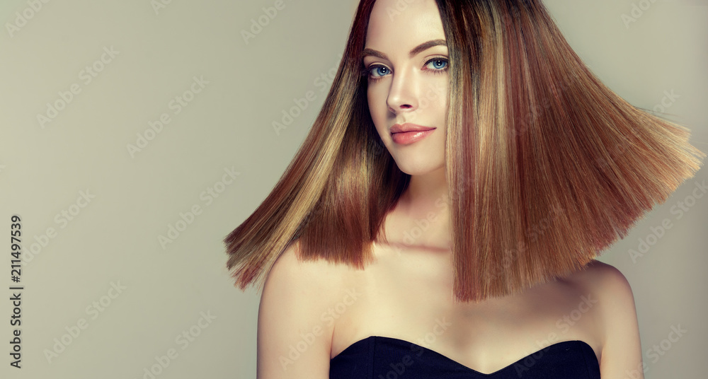 Beautiful model girl with shiny brown and straight long hair .Keratin  straightening .Treatment, care and spa  length hairstyle.  Coloring, ombre,and highlighting Stock Photo | Adobe Stock