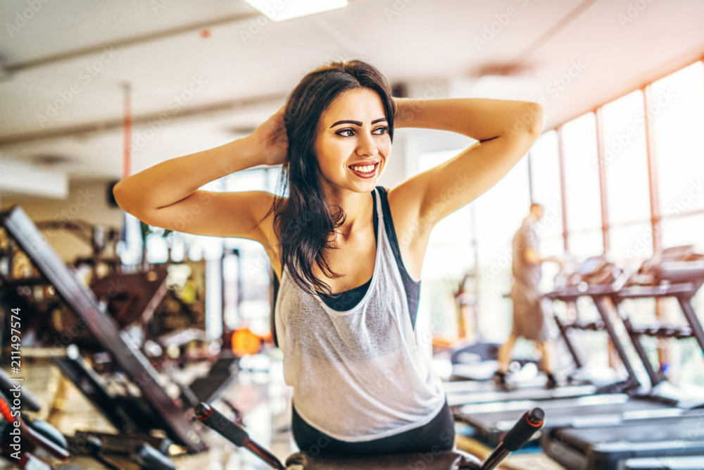 Cute sporty girl workout in the gym Cute sporty girl workout in the gym