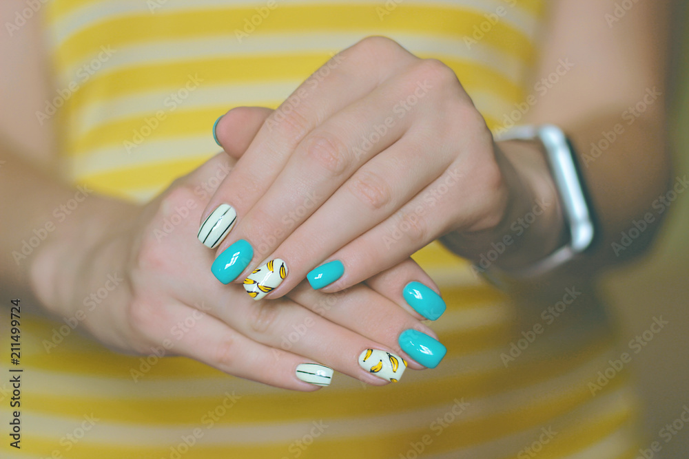 Premium Photo | Turquoise nail art female manicure on a light wooden  background long almondshaped nails closeup
