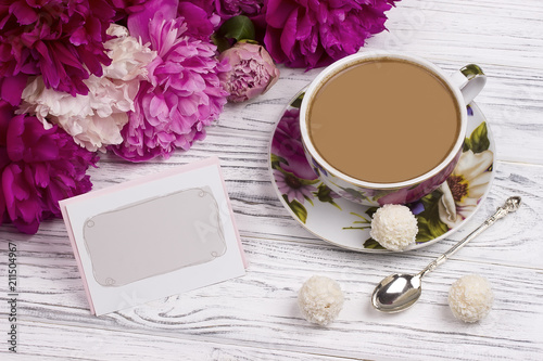 Peony with greeting card teacup and spoon.