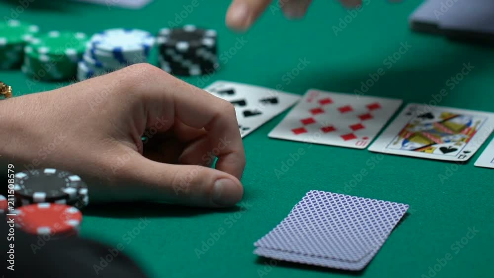 Lucky gambler checking cards, winning combination in poker, ace-high straight Lucky gambler checking cards, winning combination in poker, ace-high straight