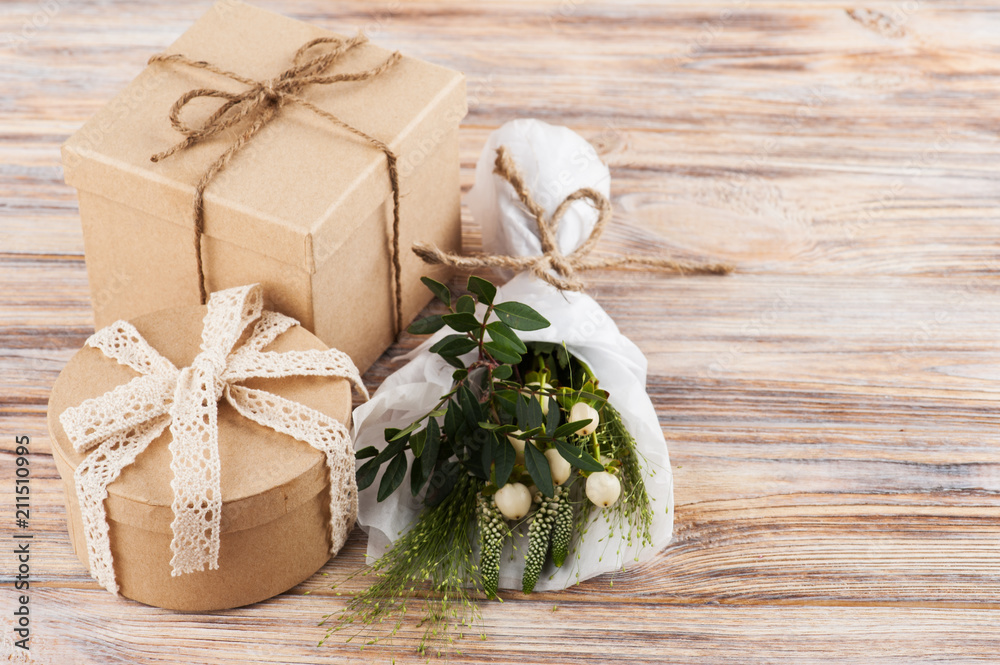 Rustic craft gift boxes with wild flowers Rustic craft gift boxes with wild flowers