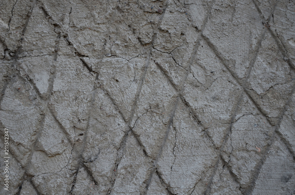 Soil texture. Footprint on earth. Rhombus. Land. The background of the earth. Soil texture. Footprint on earth. Rhombus. Land. The background of the earth.