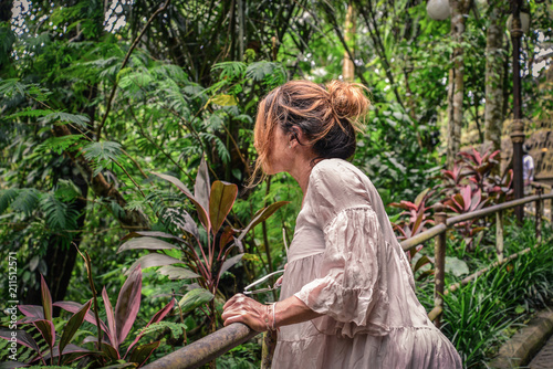 Beautiful woman enjoying the view of the jungle