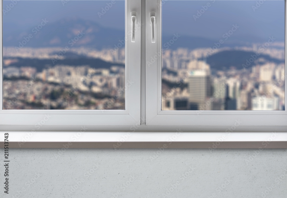Window with Sill in living Apartments and urban View to the City Window with Sill in living Apartments and urban View to the City