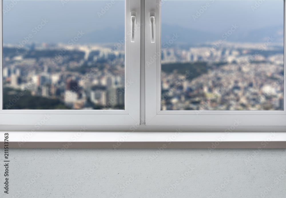 Window with Sill in living Apartments and urban View to the City Window with Sill in living Apartments and urban View to the City