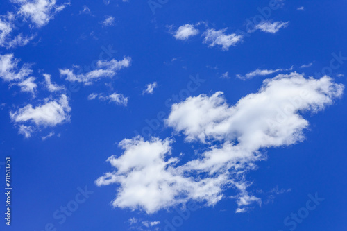 White fluffy clouds in a deep blue sky