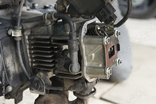 Repair of motorcycle engine, motor, in garage, close-up