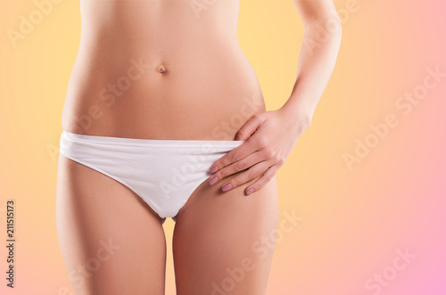 health and beauty - woman in cotton underwear showing slimming concept © alimyakubov