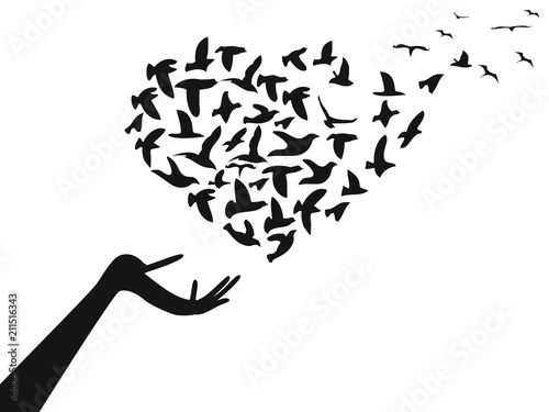 hand with Heart shaped flying birds