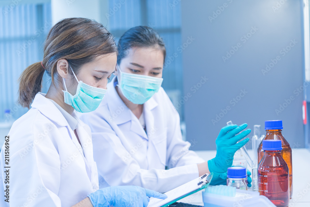 Asian scientist working in the lab,Doing experiment for product,The researchers analyzed to find the results of the experiment. Asian scientist working in the lab,Doing experiment for product,The researchers analyzed to find the results of the experiment.