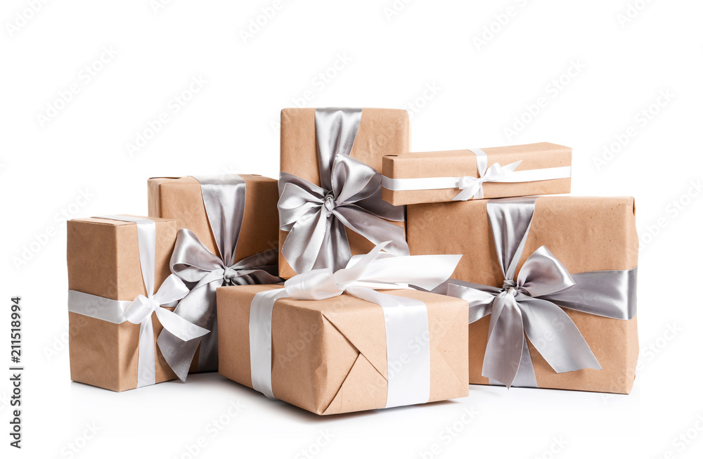 Obraz premium Beautifully wrapped gift boxes on white background