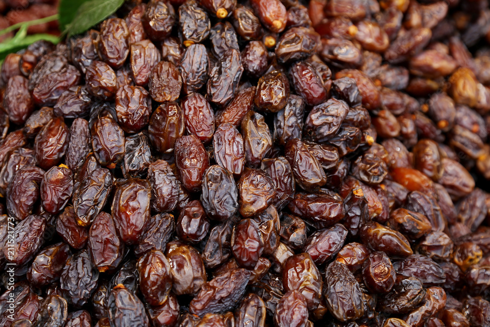 Delicious juicy raw ripe dates fruits Delicious juicy raw ripe dates fruits