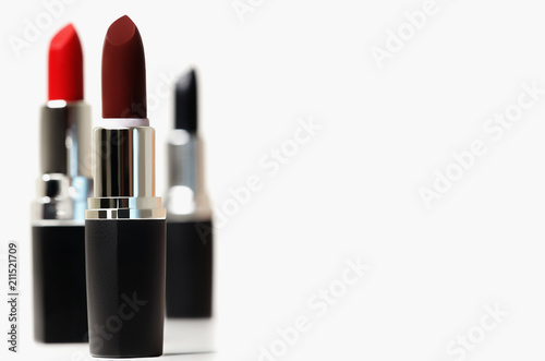 Set of color lipsticks. Red lipstick, black lipstick, wine lipst photo