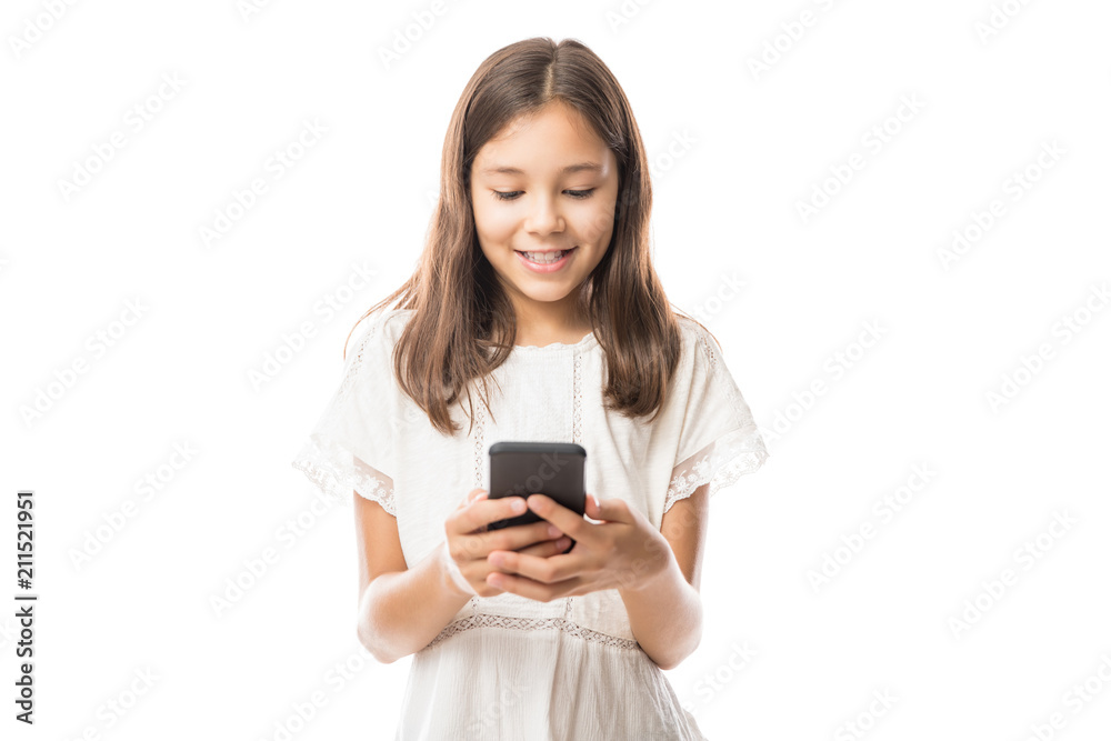 Young latin girl in white blouse using smartphone Young latin girl in white blouse using smartphone