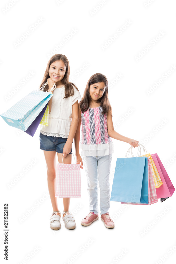 Two cute girls with shopping bags