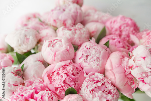 Fototapeta Naklejka Na Ścianę i Meble -  Wallpaper. Lovely flowers pink peonies . Floral compositions, daylight.