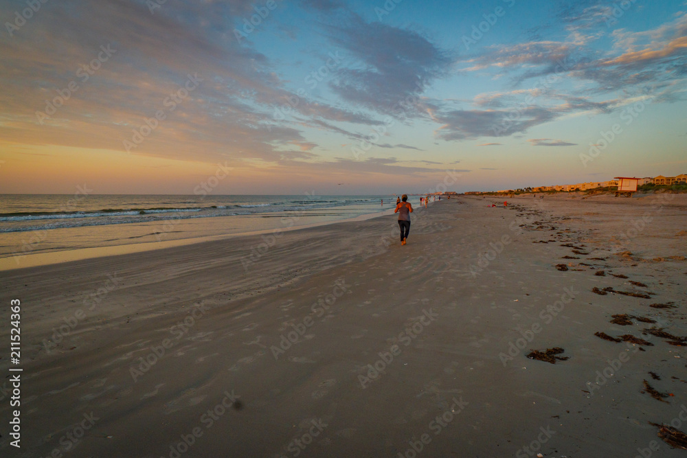Naklejka premium Walking on the beach