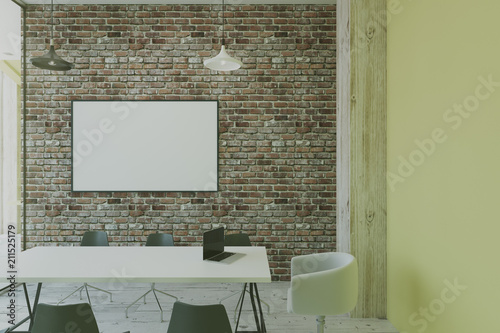 blank picture frame on brick wall