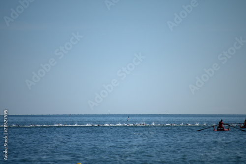 swimming race,sport,fun,water,sea,horizon,summer,sky,blue