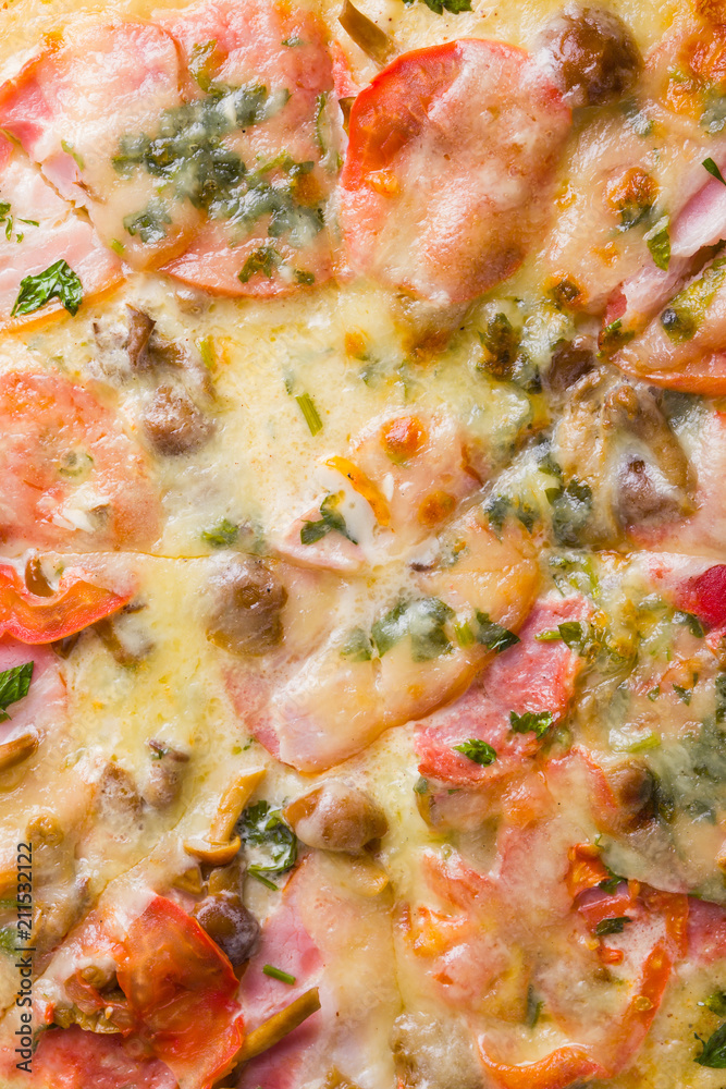 Italian pizza on wooden boards, pizza with bacon, dried tomatoes and Parmesan cheese, Italian cuisine, appetizing dish with meat and cheese, copy space Italian pizza on wooden boards, pizza with bacon, dried tomatoes and Parmesan cheese, Italian cuisine, appetizing dish with meat and cheese, copy space