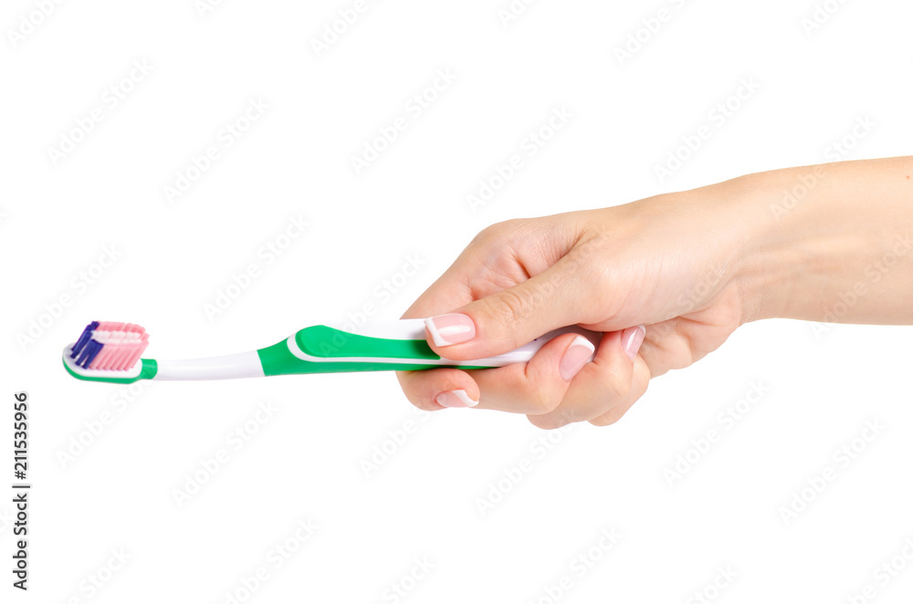 Toothbrush in hand on white background isolation Toothbrush in hand on white background isolation