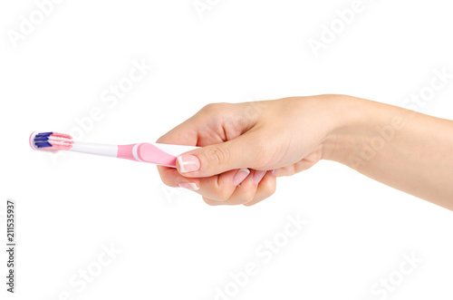 Toothbrush in hand on white background isolation