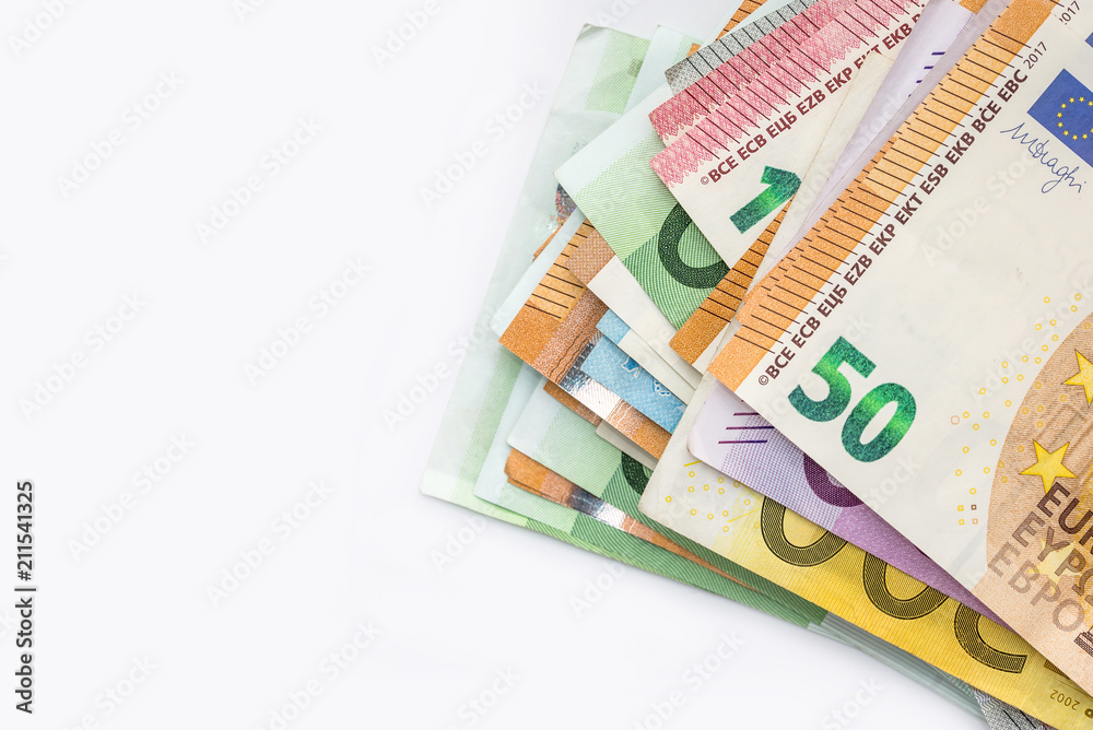 Pile of euro banknotes isolated on white background - obrazy, fototapety, plakaty 