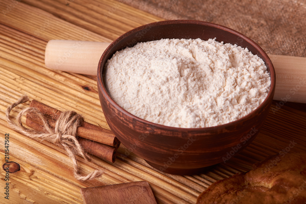 apricot pie and a bowl with flour and other ingredients and tools table apricot pie and a bowl with flour and other ingredients and tools table