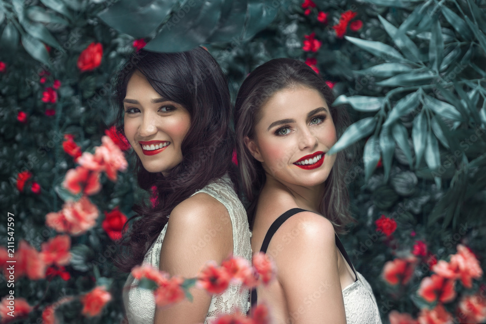 © Svetlana Radayeva - Summer portrait of two young women with blooming flowers wreath