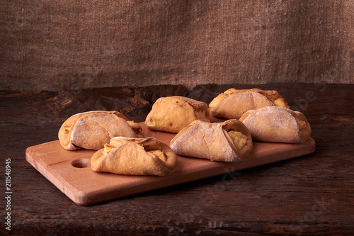 Cookies with Cottage cheese baked in oven  on wooden table and black background. Close up  selective focus. Concept of homemade food