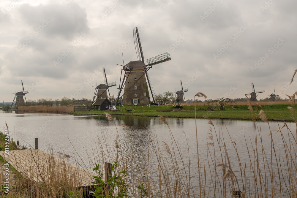 Windmill in Kinderdijk, the Netherlands on a cloudy day