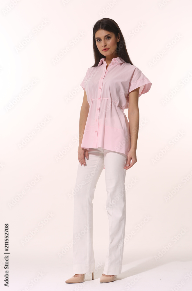 indian student model girl posing in formal blue blouse and trousers high heels stiletto shoes full body length isolated on white indian student model girl posing in formal blue blouse and trousers high heels stiletto shoes full body length isolated on white