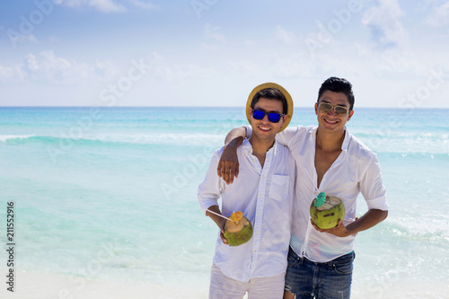 Couple of men enjoying at the beach
