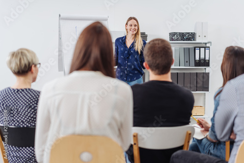 Attractive woman giving a presentation or lecture