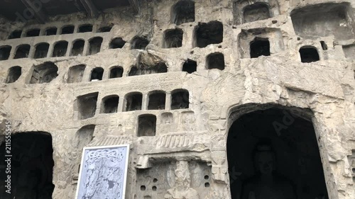 Panning view of the Longmen Grottoes in Luoyang, China