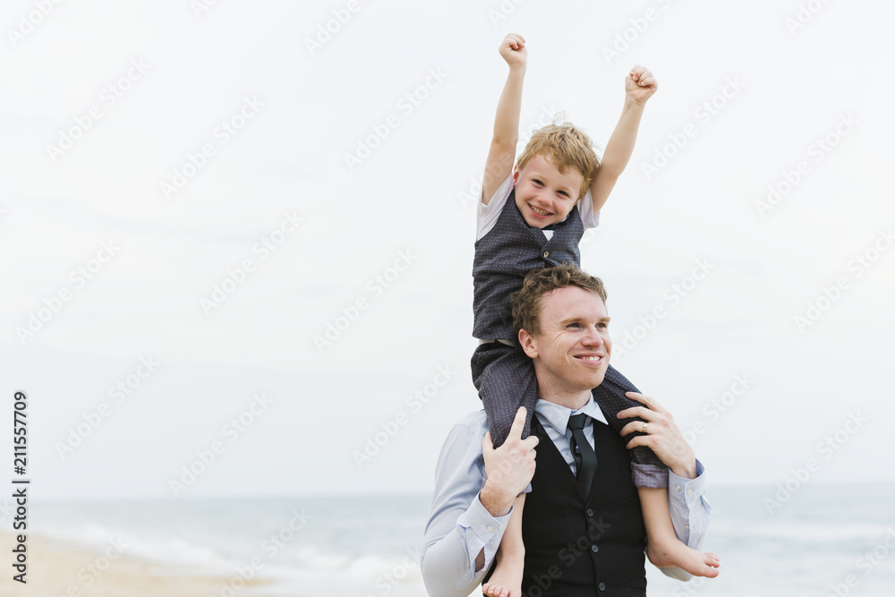 Cheerful family at beach wedding ceremony Cheerful family at beach wedding ceremony
