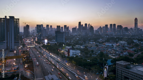 Beautiful cityscape with busy road at sunset time © Creativa Images