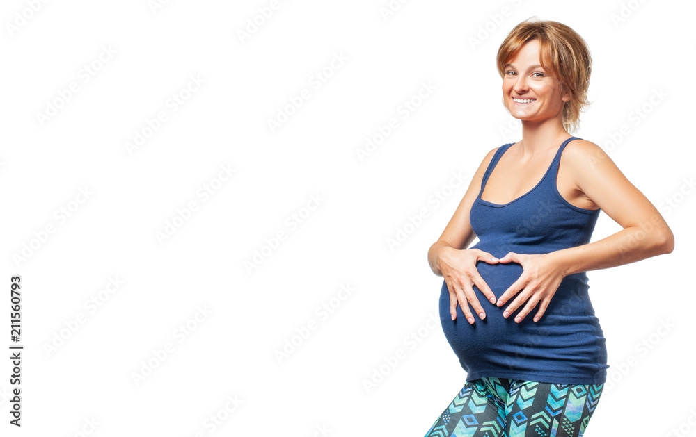 Happy pregnant woman touching her belly with hands. Happy pregnant woman touching her belly with hands.
